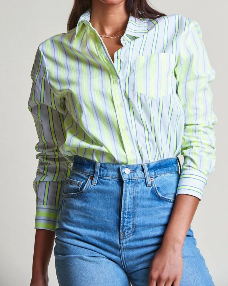 Side of a model wearing a size L The Boyfriend Shirt in Yellow Fluorescent in Yellow Fluorescent by THE SHIRT. | dia_product_style_image_id:351944
